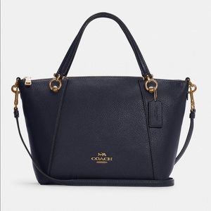 NET Coach Kacey Satchel